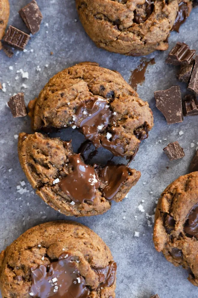 Coffee cookie pulled apart with gooey chocolate