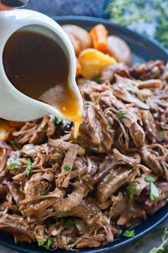 Pouring gravy on instant pot pot roast