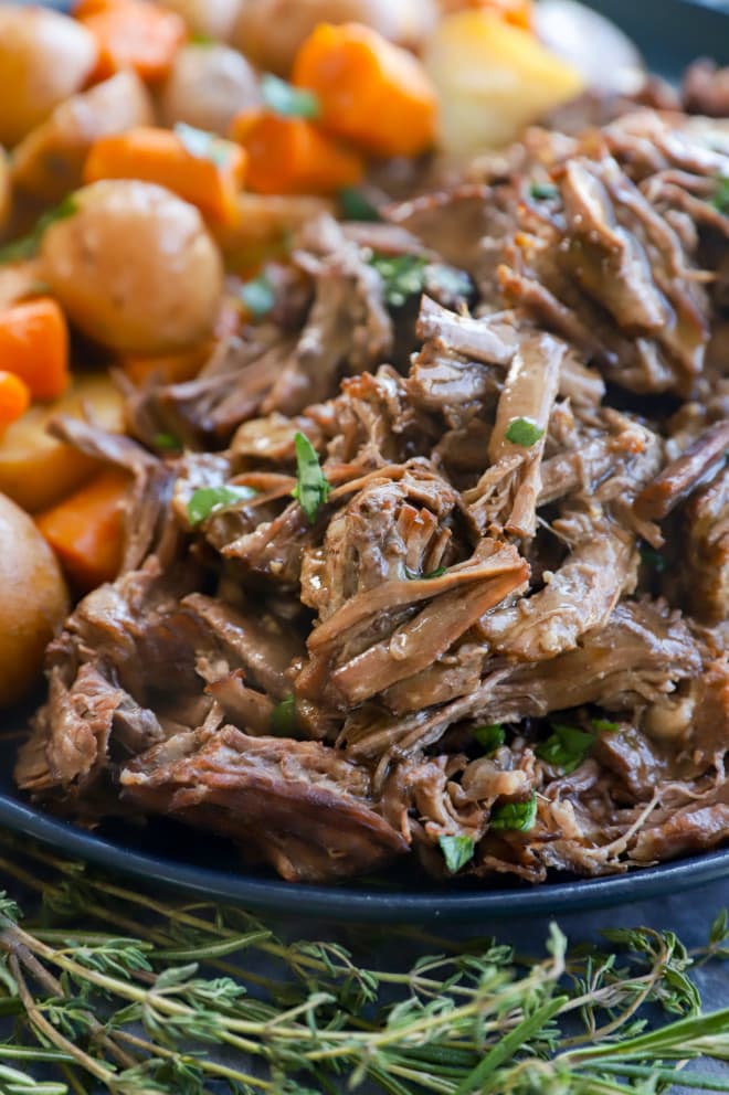 Tender cooked chuck roast with potatoes and carrots