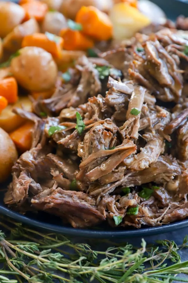 Tender cooked chuck roast with potatoes and carrots