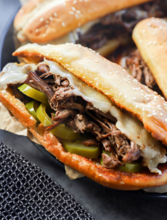Image of a beef sandwich with hot peppers and cheese