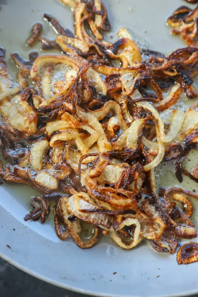 caramelized onions in a skillet image