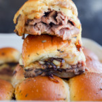 roast beef sliders on top of a baking dish