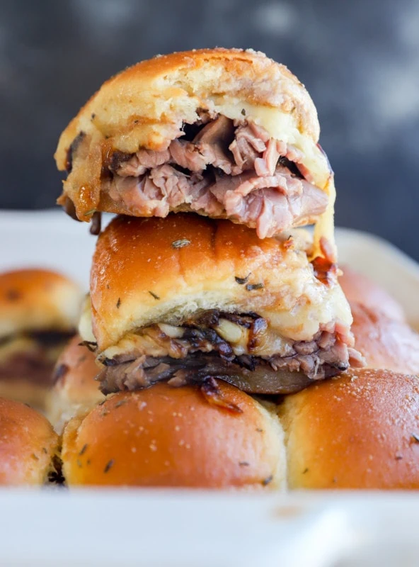 roast beef sliders on top of a baking dish
