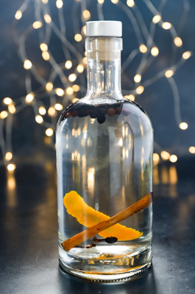 Infusing gin with Christmas whole spices and orange peel