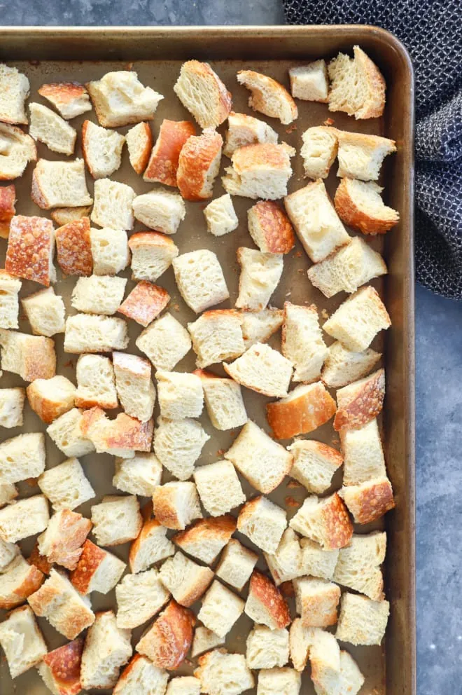 toasted bread cubes on sheet pan