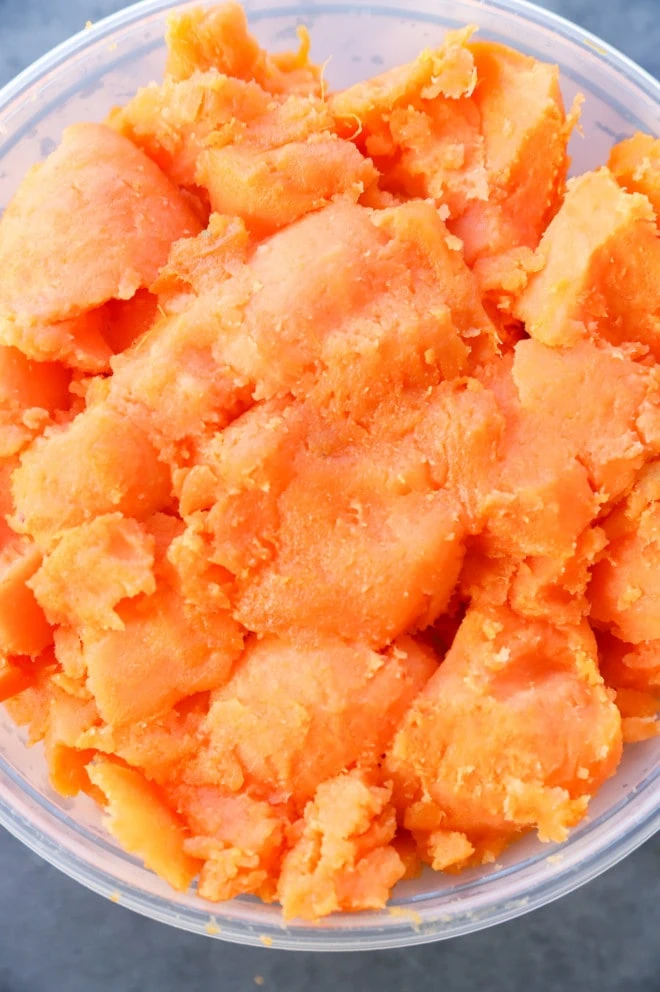 Mashed cooked yams in a bowl