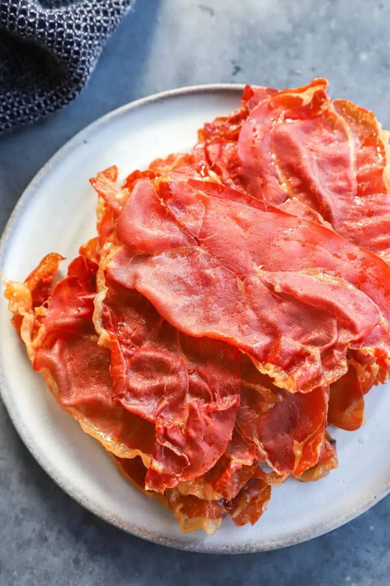 pile of crispy prosciutto di parma on a plate