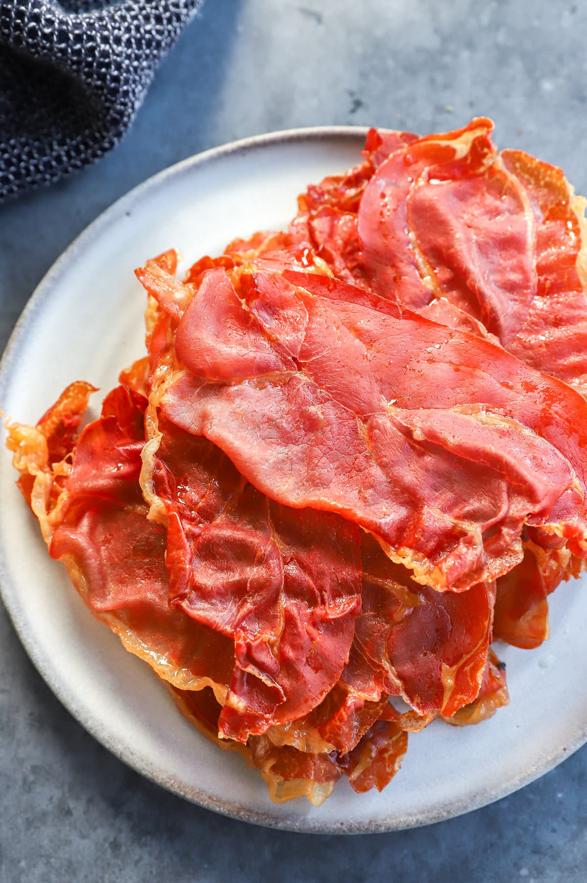 pile of crispy prosciutto di parma on a plate