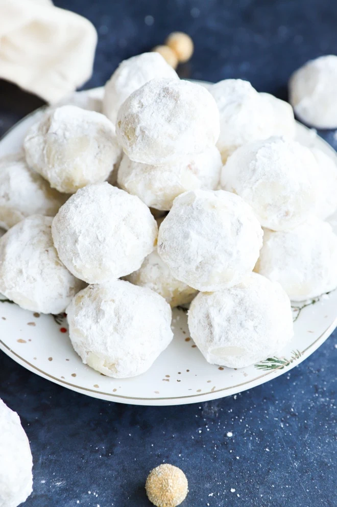plate of snowball cookies in a pile
