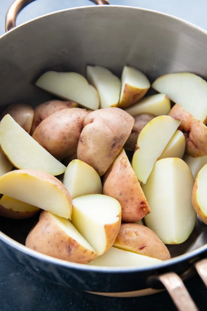 parboiled potatoes in pot