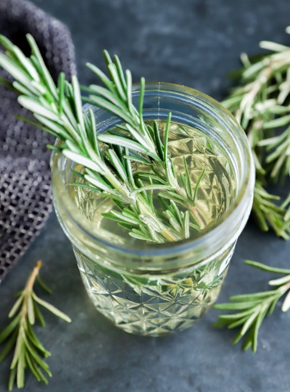 image of fresh herbs in a sweetener in a jar