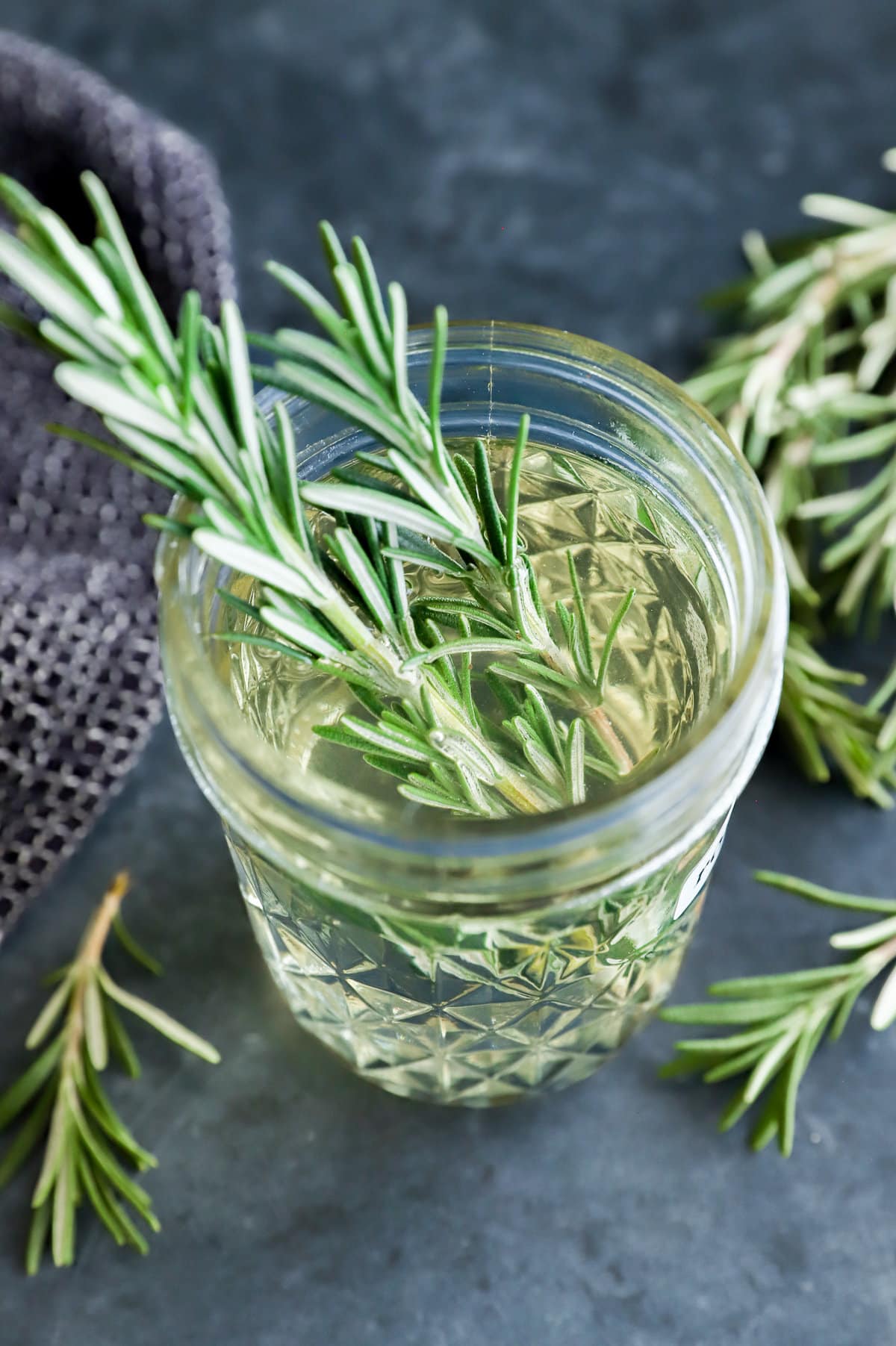 image of fresh herbs in a sweetener in a jar