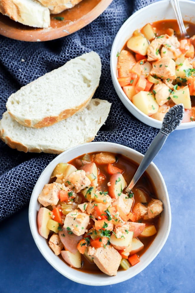 Instant Pot Chicken stew in bowls with slices of bread