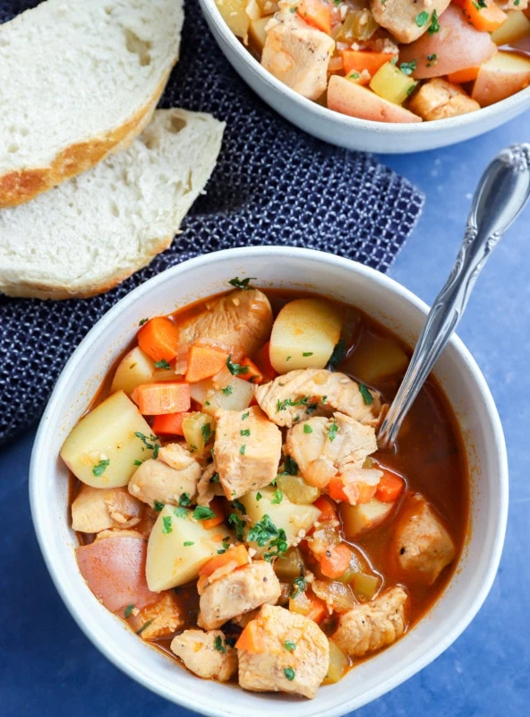 bowl of hearty vegetable and protein stew made in the pressure cooker