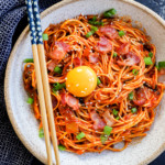 easy 20 minute noodle dish with egg yolk on top