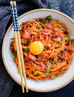 easy 20 minute noodle dish with egg yolk on top