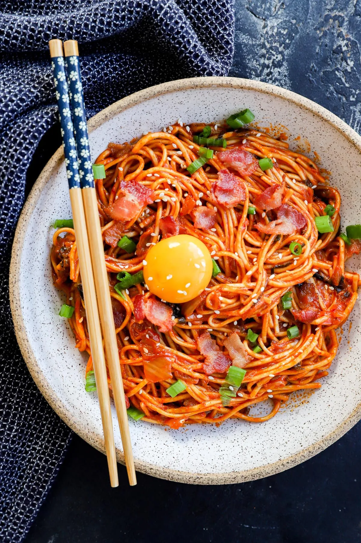 easy 20 minute noodle dish with egg yolk on top