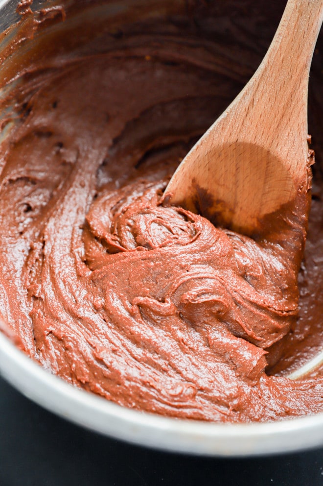 brownie batter in bowl with a spoon