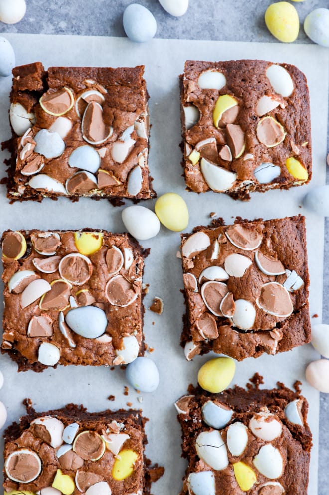 easter brownies on parchment paper with mini eggs