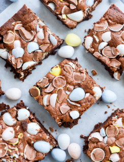 mini eggs on top of chocolate baked treats