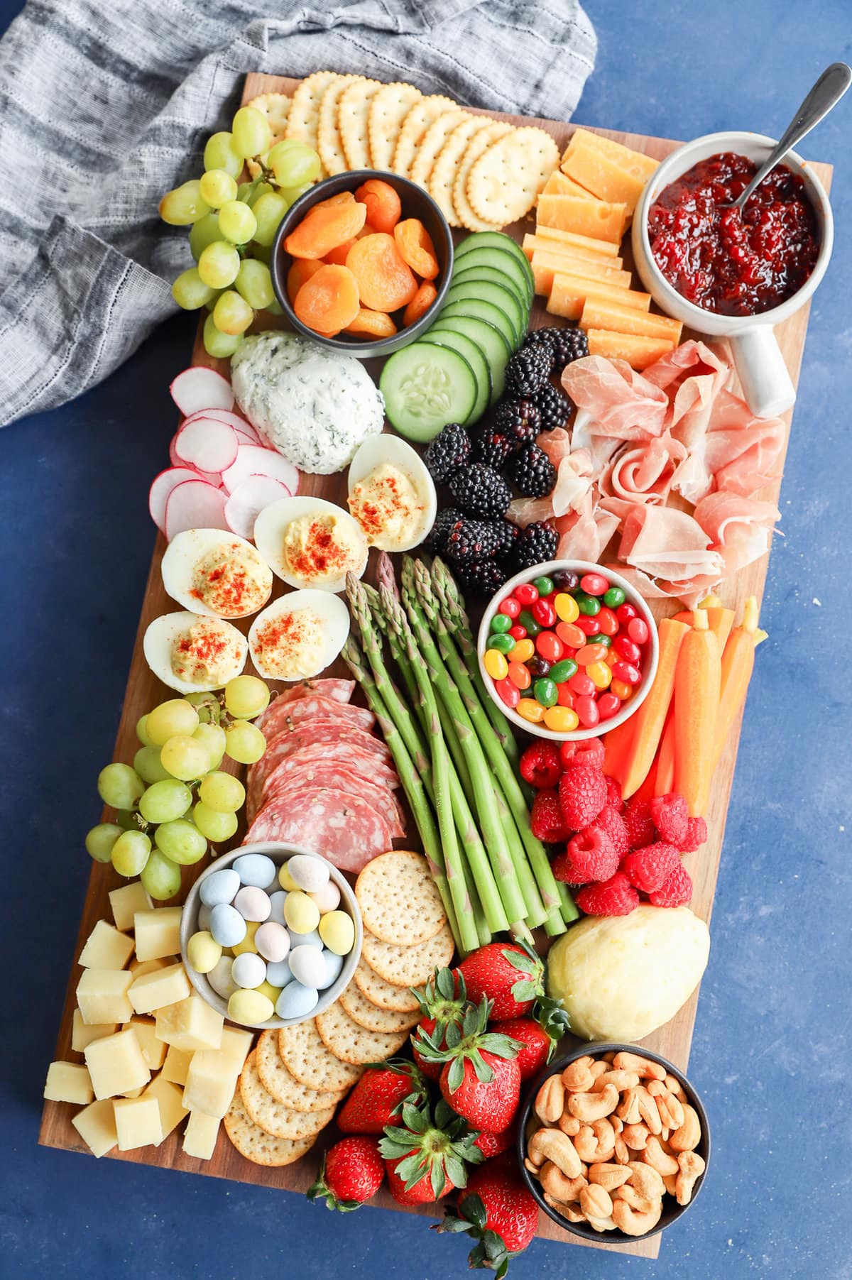 Easter charcuterie board with pretty linen for spring