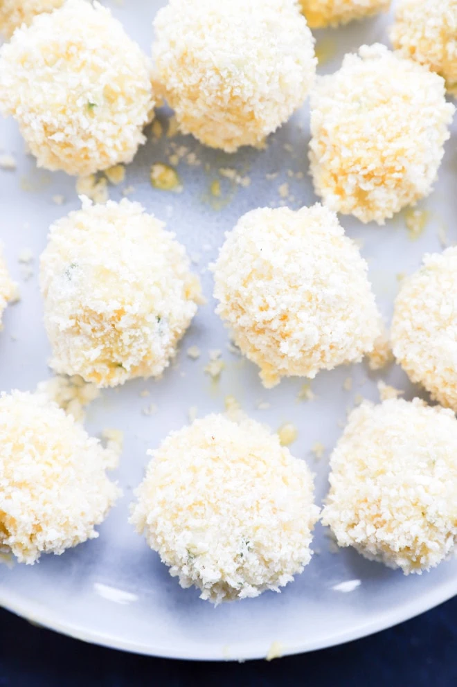 making potato cheese balls coated in panko breadcrumbs