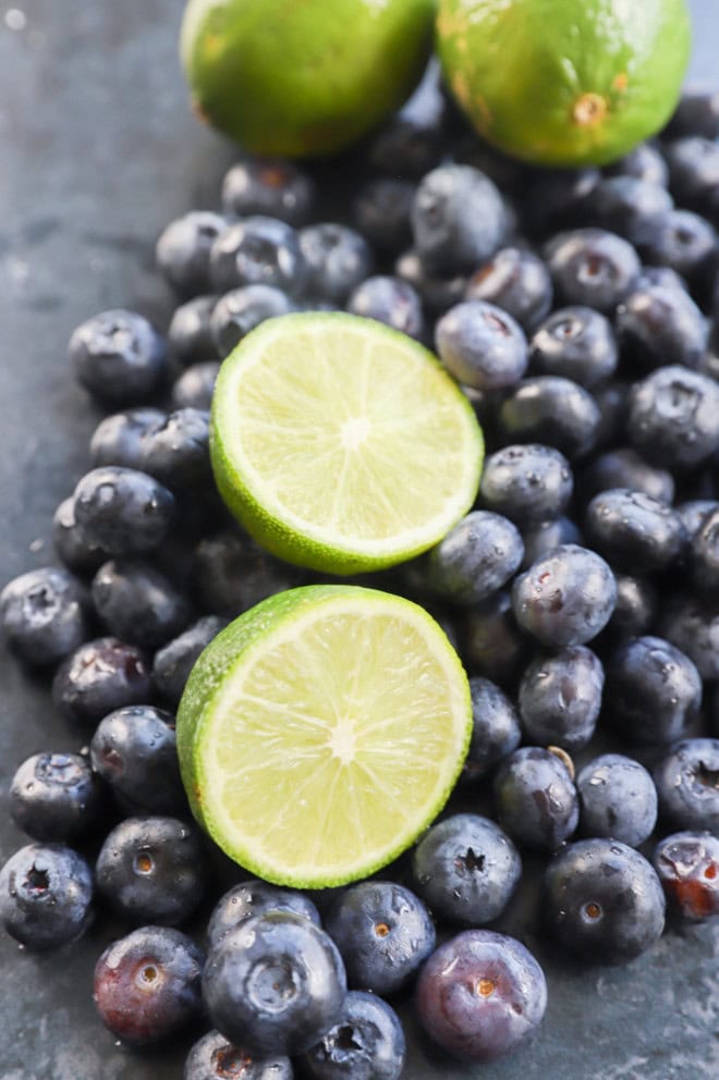 fresh blueberries and lime halves