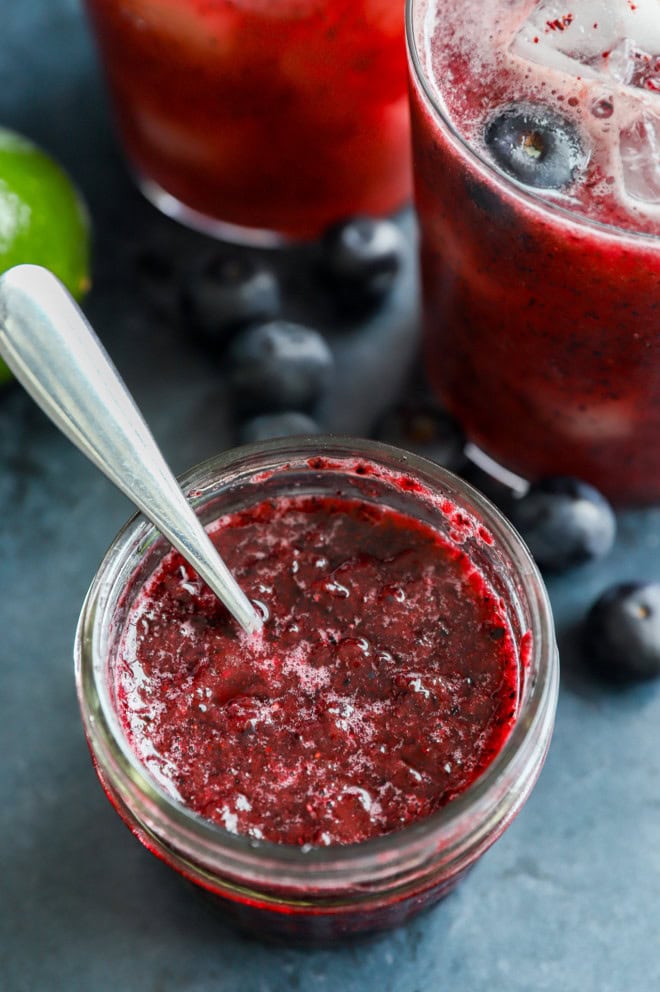 blueberry sauce in a small mason jar to make cocktails