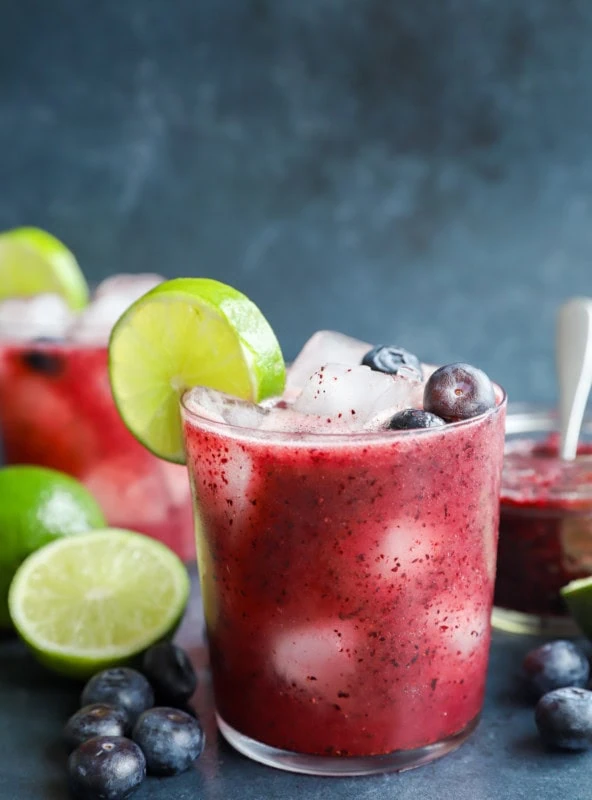 fresh berry cocktail with tequila and lime in a glass