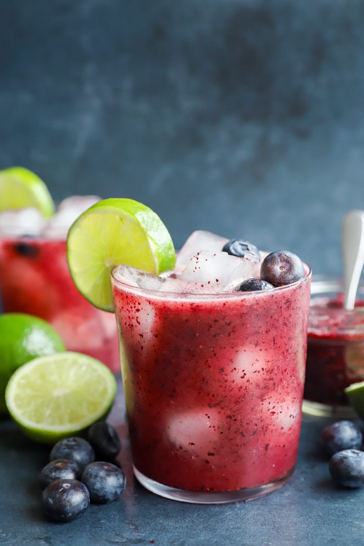 fresh berry cocktail with tequila and lime in a glass