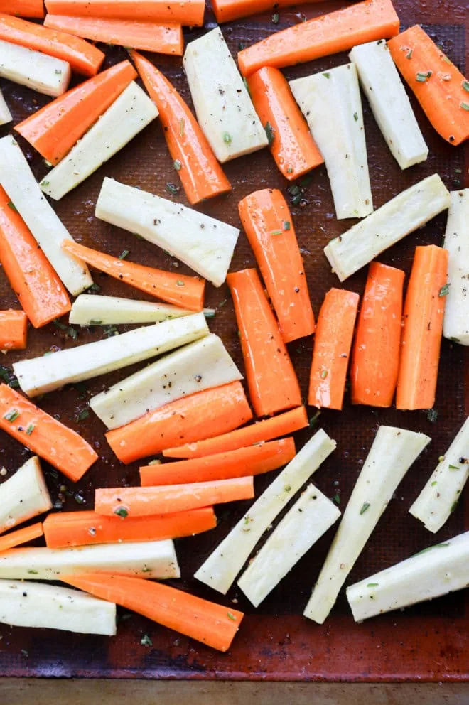 before baking vegetables on a sheet pan with fresh herbs