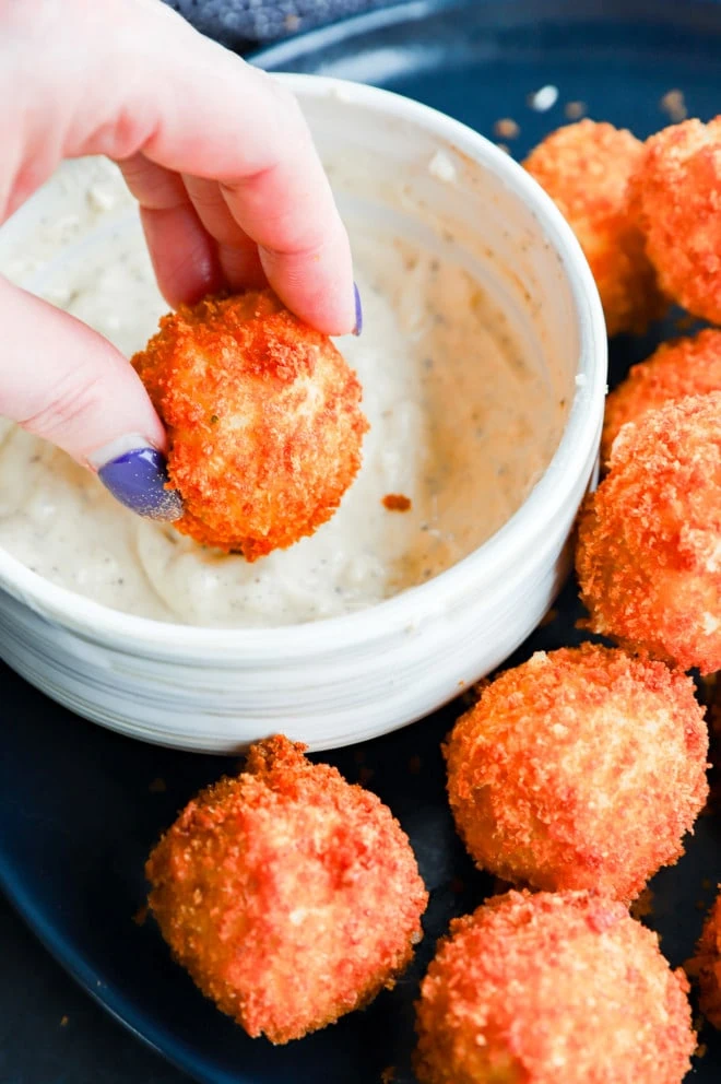 dipping potato cheese ball in garlic aioli