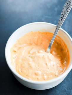 chipotle aioli in a bowl with a spoon