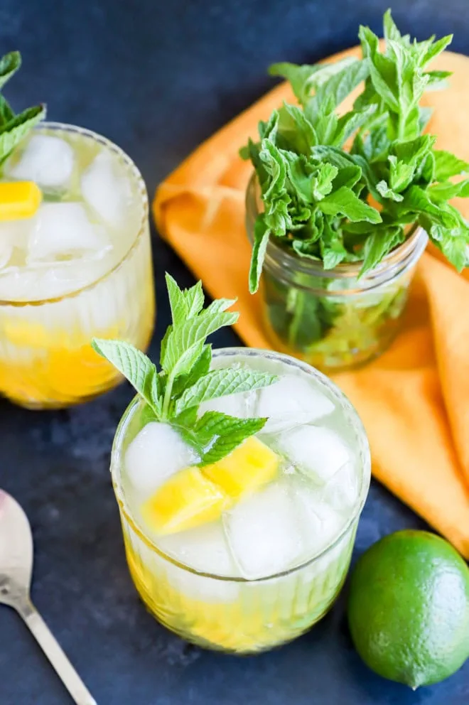 Cuban cocktail with fresh fruit and mint sprigs