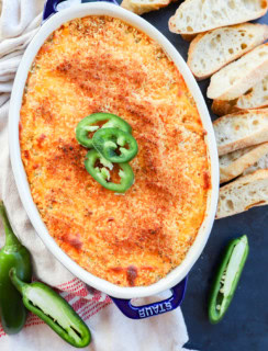 baked jalapeno popper dip with jalapeno slices on top