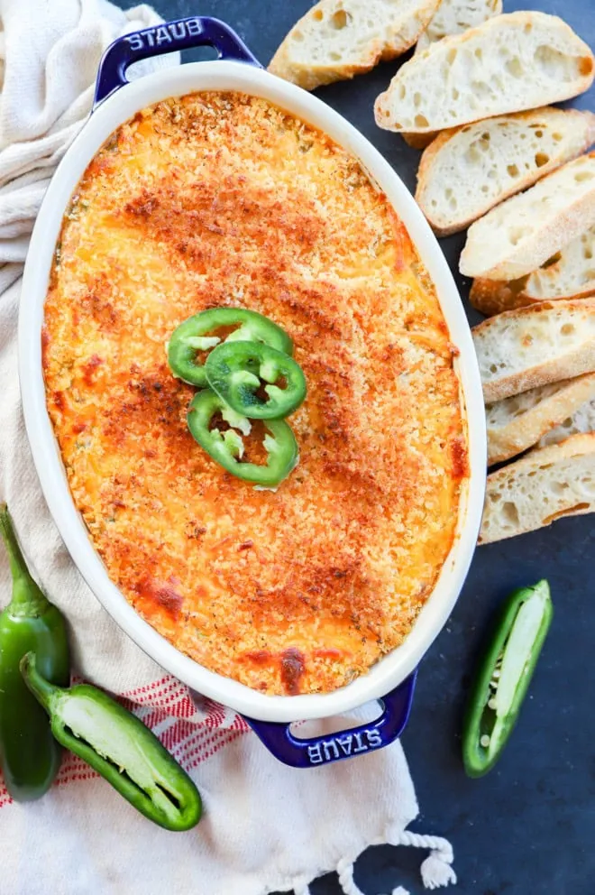 baked jalapeno popper dip with jalapeno slices on top