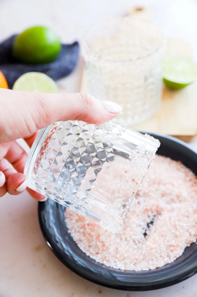 Rimming a cocktail glass with salt