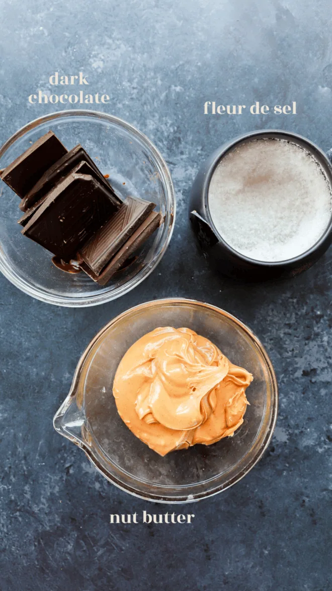 nut butter, chocolate and flaky sea salt in bowls