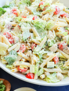 chicken caesar pasta salad in a large bowl
