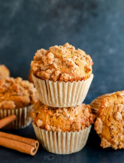 pumpkin banana muffins stacks with cinnamon sticks