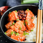 bowl of salmon bites glazed with honey sesame ginger marinade