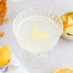 easy lemony cocktail with lemon twist