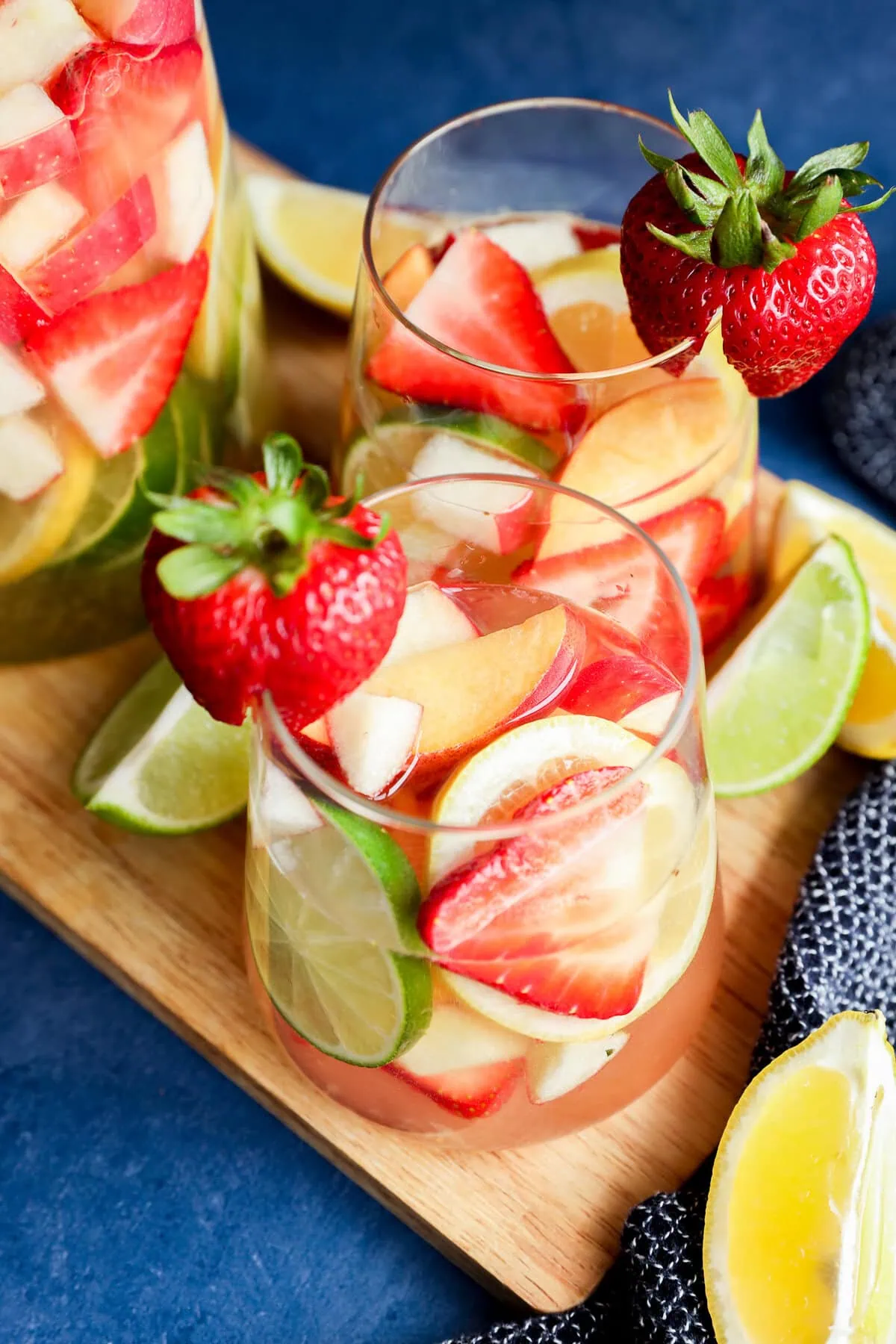 easy White wine sangria with fresh fruit and citrus wedges on the side