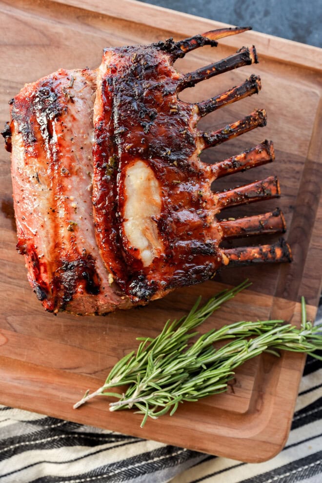 rack of meat on cutting board before slicing