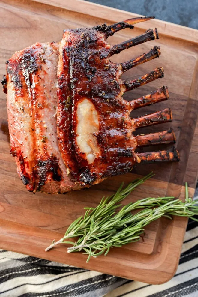 rack of meat on cutting board before slicing