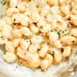 Gnocchi carbonara in a skillet cooking