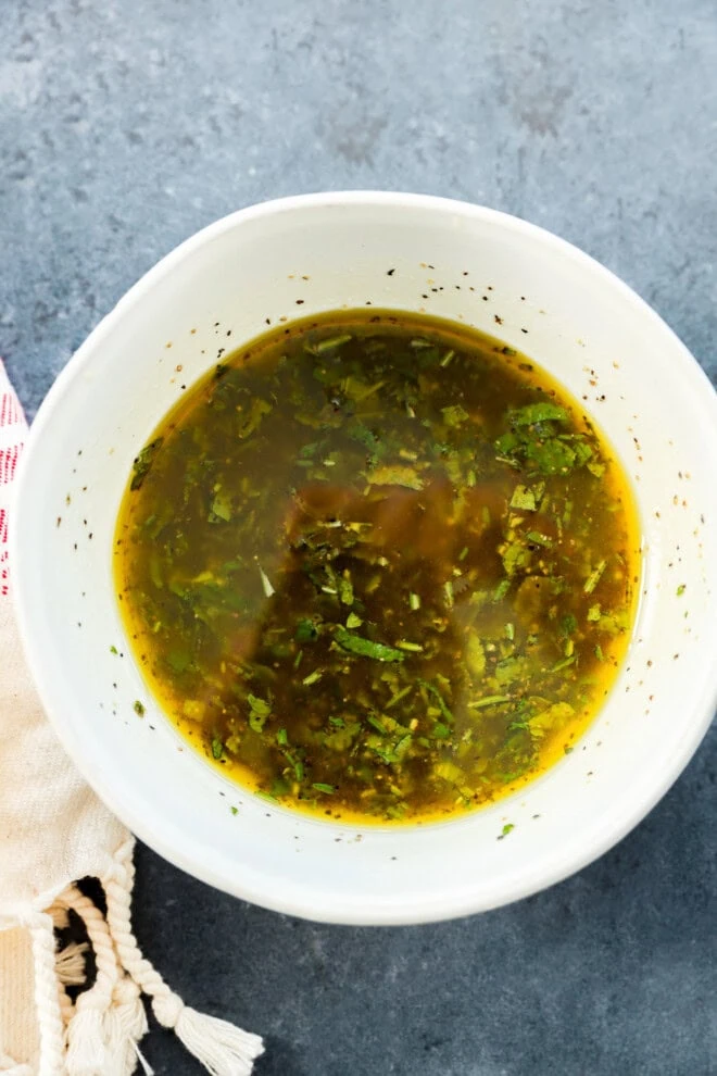 lamb marinade mixture in bowl with linen