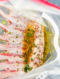 meat in bag with herbs and oil to make it juicy