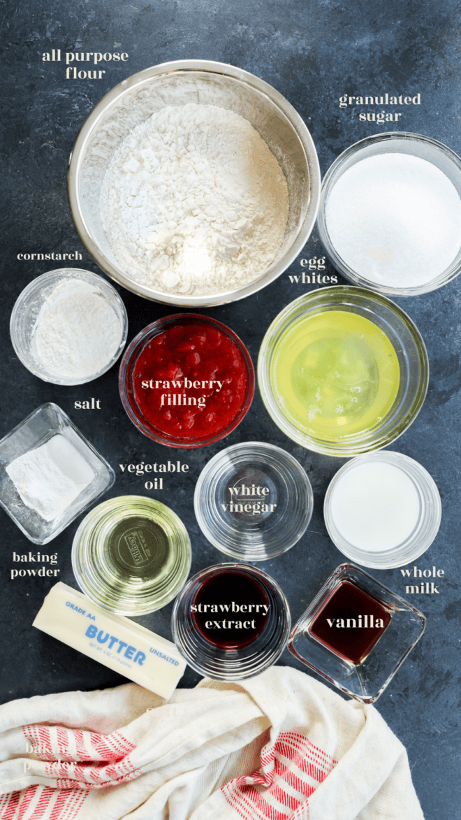 strawberry cake with strawberry filling ingredients in bowls with text labels